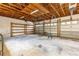 Three car garage with high ceilings and lots of room for storage and parking at 12435 Oak St, San Antonio, FL 33576