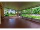 Expansive screened-in patio with ample space, great for enjoying the outdoors while being protected from the elements at 12435 Oak St, San Antonio, FL 33576