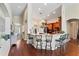 Bright kitchen with breakfast bar, wood cabinets, and modern appliances at 12443 Adventure Dr, Riverview, FL 33579