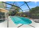 Relaxing screened-in pool area, perfect for outdoor entertaining and enjoying the sunny weather at 12443 Adventure Dr, Riverview, FL 33579