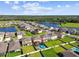 Community aerial view with homes and neighborhood lakes, landscaping, and green spaces at 12643 Horseshoe Bend Dr, Lithia, FL 33547