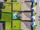 Drone eye view of a home's layout, with a pool and a trampoline in a fenced backyard at 12643 Horseshoe Bend Dr, Lithia, FL 33547