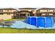 Cozy backyard featuring a pool, screened patio, and well-maintained lawn for outdoor enjoyment at 12643 Horseshoe Bend Dr, Lithia, FL 33547