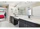 Modern bathroom featuring double sinks, ample counter space, and sleek fixtures at 12643 Horseshoe Bend Dr, Lithia, FL 33547