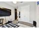 Neutral bedroom featuring a cozy bed, TV, and ample closet space at 12643 Horseshoe Bend Dr, Lithia, FL 33547