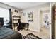 Bedroom featuring a desk, carpet, and shoe shelves at 12643 Horseshoe Bend Dr, Lithia, FL 33547