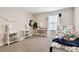 Comfortable bedroom featuring a desk area with plenty of natural light at 12643 Horseshoe Bend Dr, Lithia, FL 33547