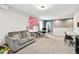 Spacious bonus room provides a welcoming atmosphere, ideal for both relaxation and productive work at 12643 Horseshoe Bend Dr, Lithia, FL 33547