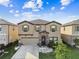 Beautiful home with manicured landscaping, stone accents, and a spacious two-car garage at 12643 Horseshoe Bend Dr, Lithia, FL 33547