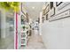 Bright hallway with modern decor, light wood flooring, and a view extending to the living area at 12643 Horseshoe Bend Dr, Lithia, FL 33547