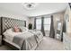 Tranquil main bedroom featuring neutral walls, plush bedding, and elegant accents at 12643 Horseshoe Bend Dr, Lithia, FL 33547