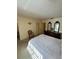 Bedroom featuring carpet, a dresser and a chair at 1332 Fuchsia Dr, Holiday, FL 34691