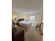 Cozy bedroom with large dresser and bedside tables at 1332 Fuchsia Dr, Holiday, FL 34691