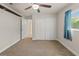 Bedroom featuring a closet and a window at 13375 Newcastle Ave, Spring Hill, FL 34609