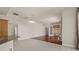 Open living area with hardwood flooring and views into the kitchen at 13375 Newcastle Ave, Spring Hill, FL 34609