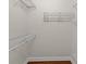 Walk-in closet offering multiple shelves for ample storage and organization of your wardrobe at 13375 Newcastle Ave, Spring Hill, FL 34609