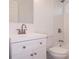 Clean and modern bathroom with a white vanity, updated fixtures, and a shower-tub combination with subway tile at 1344 S Michigan Ave, Clearwater, FL 33756