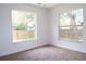 Carpeted bedroom with natural light and large windows at 1344 S Michigan Ave, Clearwater, FL 33756