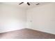 This bedroom is carpeted with a ceiling fan and white walls at 1344 S Michigan Ave, Clearwater, FL 33756