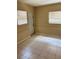Bedroom with neutral walls, tiled flooring, and natural lighting at 1427 15Th S St, St Petersburg, FL 33705