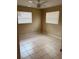 Bedroom with tiled flooring, ceiling fan and two windows providing ample light at 1427 15Th S St, St Petersburg, FL 33705