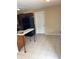 Eat-in kitchen featuring dark cabinetry, black refrigerator and neutral walls at 1427 15Th S St, St Petersburg, FL 33705