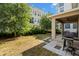 Backyard space with a grill, patio, and green space for outdoor enjoyment at 1520 W Fig St, Tampa, FL 33606