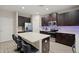 Beautiful kitchen featuring an island with bar seating, and stainless steel appliances at 1520 W Fig St, Tampa, FL 33606