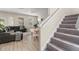 Inviting living area with hardwood floors, comfortable seating, and plenty of natural light at 1520 W Fig St, Tampa, FL 33606