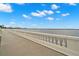 Scenic waterfront view from a promenade, featuring a picturesque cityscape in the background at 1520 W Fig St, Tampa, FL 33606
