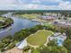 Aerial view featuring the river, city buildings, green space, and nearby amenities at 1543 W Cass St, Tampa, FL 33606