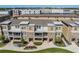 Aerial view of townhomes showcasing the neighborhood's layout and landscaping at 1543 W Cass St, Tampa, FL 33606