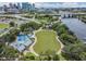 Aerial of green park space with water park surrounded by downtown landscape and city skyline at 1543 W Cass St, Tampa, FL 33606
