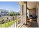 Charming balcony with outdoor seating and a view of the community landscape at 1543 W Cass St, Tampa, FL 33606