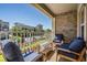 Balcony area with outdoor seating and scenic views of the surrounding neighborhood at 1543 W Cass St, Tampa, FL 33606