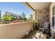 Cozy balcony featuring brick accents, plants, chairs and an open view at 1543 W Cass St, Tampa, FL 33606