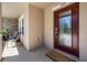Inviting front porch with seating, a welcome mat and brick accents at 1543 W Cass St, Tampa, FL 33606