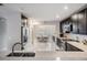 Modern kitchen with sleek cabinetry, eat in space, and stainless steel appliances at 1543 W Cass St, Tampa, FL 33606