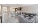 Open-concept living space with kitchen bar seating, and a comfortable sectional at 1543 W Cass St, Tampa, FL 33606