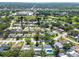Beautiful aerial view of a residential neighborhood with lush greenery, nearby amenities, and easy access to Duke Energy Trail at 1622 El Tair Trl, Clearwater, FL 33765