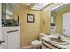 Bathroom with vanity, sink, and toilet at 1622 El Tair Trl, Clearwater, FL 33765
