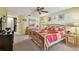 Large bedroom with a bed and ample space for relaxing at 1622 El Tair Trl, Clearwater, FL 33765