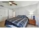 Bedroom with neutral walls, carpeted floors, and large closet at 1622 El Tair Trl, Clearwater, FL 33765