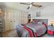 Bedroom features a large closet and cozy sleeping area at 1622 El Tair Trl, Clearwater, FL 33765