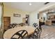 Warm and inviting dining room with elegant furnishings and a seamless flow to the living spaces at 1622 El Tair Trl, Clearwater, FL 33765