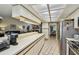 Well-lit kitchen boasts stainless steel appliances, plenty of counter space, and an open layout for modern living at 1622 El Tair Trl, Clearwater, FL 33765