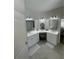 Bright bathroom with double vanities, modern fixtures, and plenty of counter space at 18108 Ashton Park Way, Tampa, FL 33647