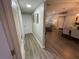Hallway that connects other spaces and leads to the living room at 18108 Ashton Park Way, Tampa, FL 33647