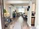 Bright and airy living room with a modern open floor plan that seamlessly flows into dining area at 18108 Ashton Park Way, Tampa, FL 33647