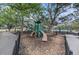 Community playground featuring slides and climbing structures provides a fun and safe recreational area for children at 18108 Ashton Park Way, Tampa, FL 33647